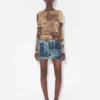 Das „Journal Double“ Baby-Tee Das „Journal Double“ Baby-Tee