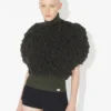 Der ärmellose Pullover mit Schlingenmuster