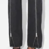Die schwarze Jeans mit Reißverschluss Die schwarze Jeans mit Reißverschluss