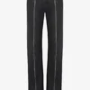 Die schwarze Jeans mit Reißverschluss Die schwarze Jeans mit Reißverschluss